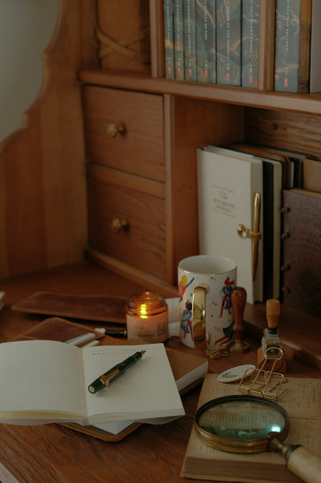 mystery writer at desk with notebook