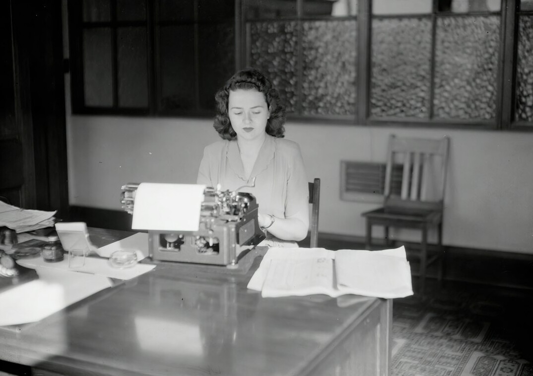 mystery writer at desk